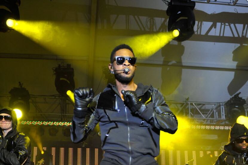 Singer Usher performs at the Super Bowl Party hosted by DIRECTV and Mark Cuban's HDNet at...