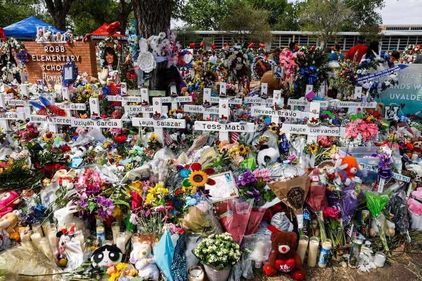 A memorial for the 19 children and two adults killed on May 24th during a mass shooting at...