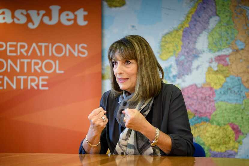 EasyJet CEO Carolyn McCall gestures during an interview at the airline's headquarters at...