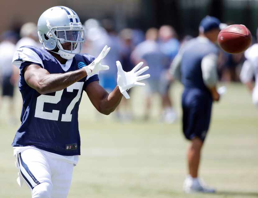 Dallas Cowboys cornerback Jourdan Lewis (27) prepares to catch the ball in a drill during...