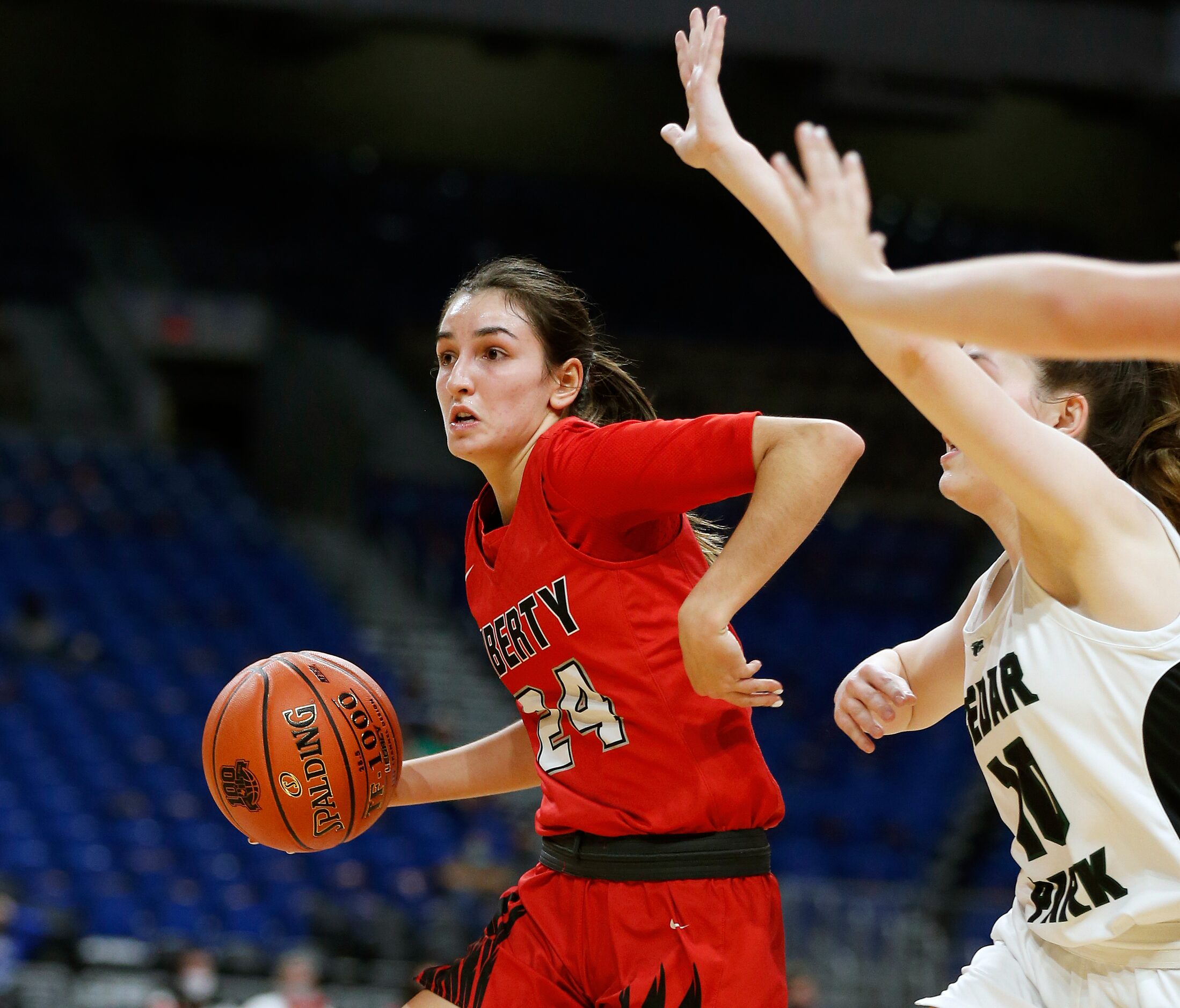 Frisco Liberty Maya Jain #24 drives on Cedar Park. Frisco Liberty vs. Cedar Park in girls...