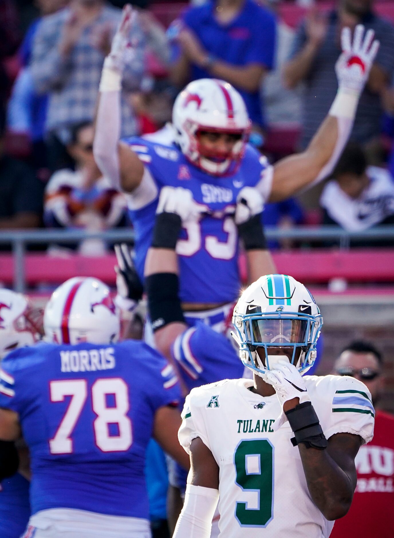 Tulane cornerback Jaylon Monroe (9) walks away as SMU tight end Kylen Granson (83)...