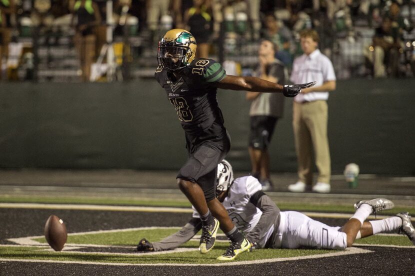 DeSoto senior defensive back Jamal Brown (18) celebrates after breaking up a pass intended...