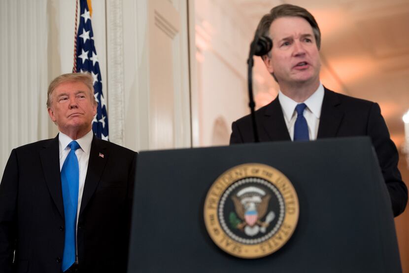 US Judge Brett Kavanaugh speaks after being nominated by US President Donald Trump (L) to...