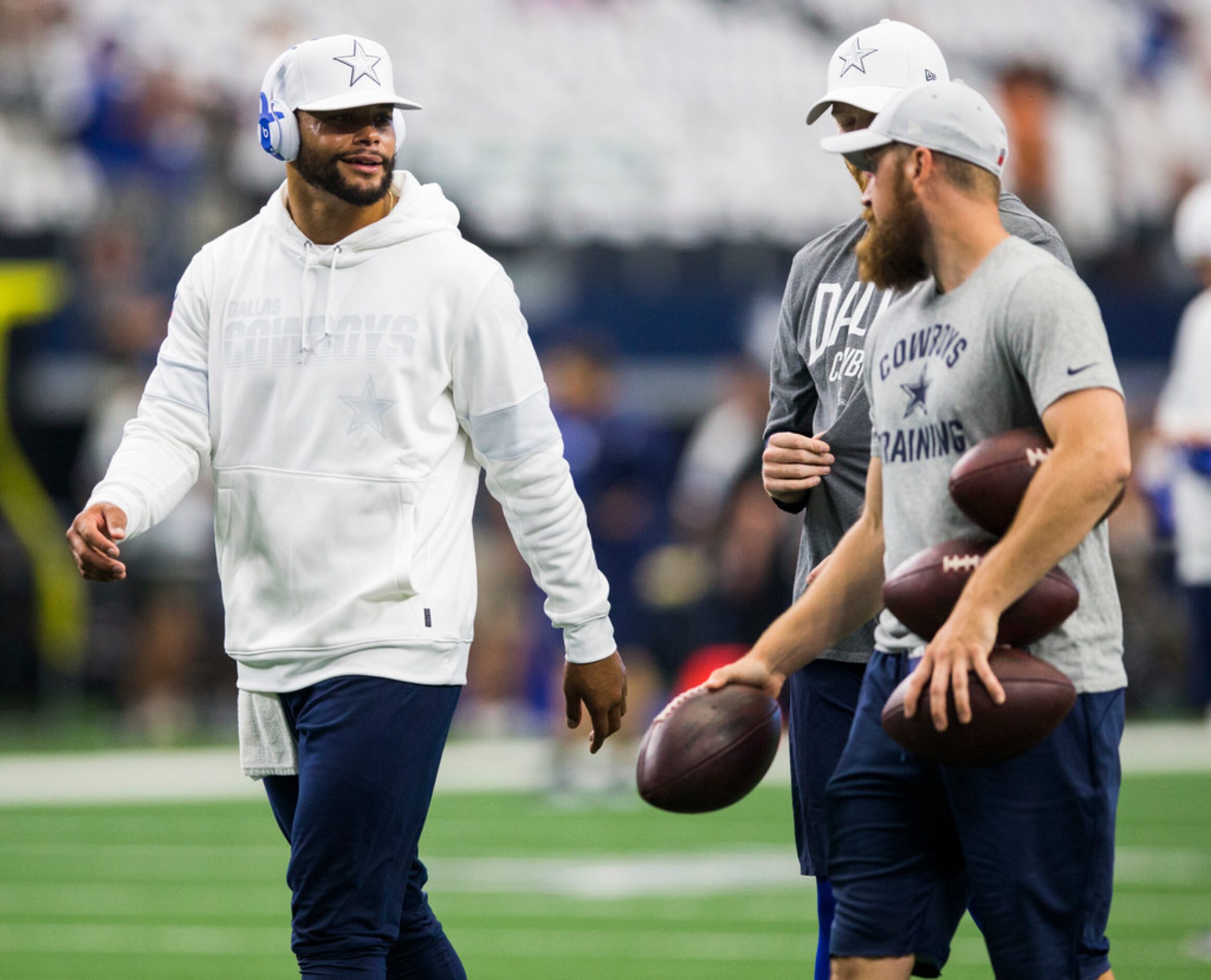 Dallas Cowboys quarterback Dak Prescott (4) warms up before an NFL game between the New York...