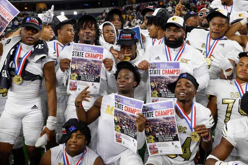 The South Oak Cliff team poses with their medals after winning the Class 5A Division II...