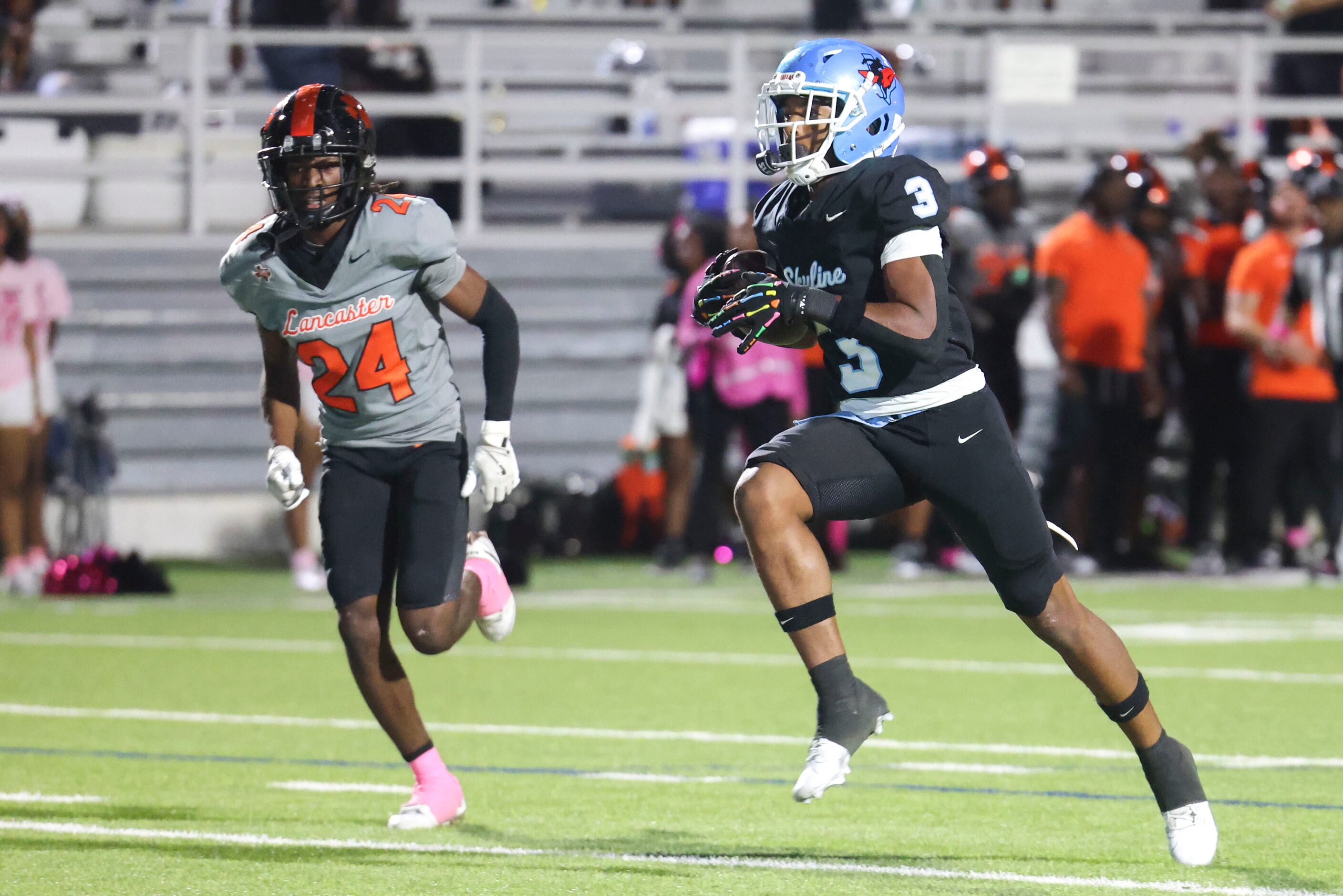 Skyline High’s Delvin Cook (3) completes a touchdown past Lancaster High’s Jamayle Sampson...