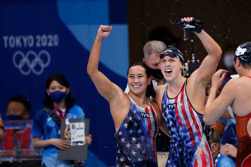 USA’s Katie Ledecky and Erica Sullivan celebrate after winning a gold medal in the women’s...