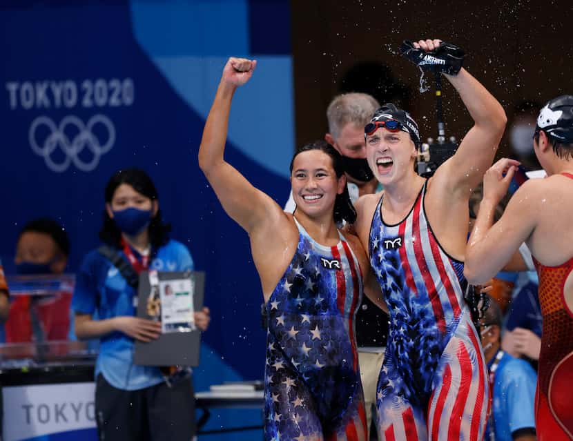 USA’s Katie Ledecky and Erica Sullivan celebrates after winning a gold medal in the women’s...