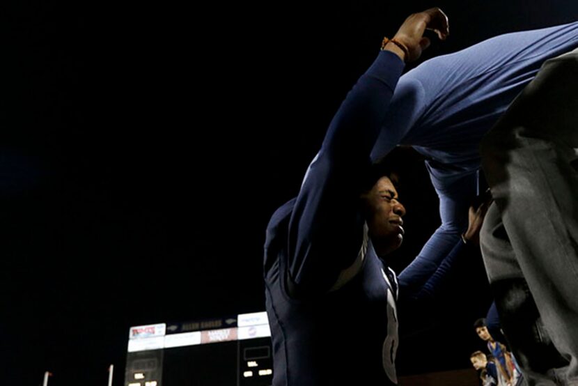  Frisco Lone Star Rangers Chris Miller cries as he reaches to hug his brother Robert Brooks,...