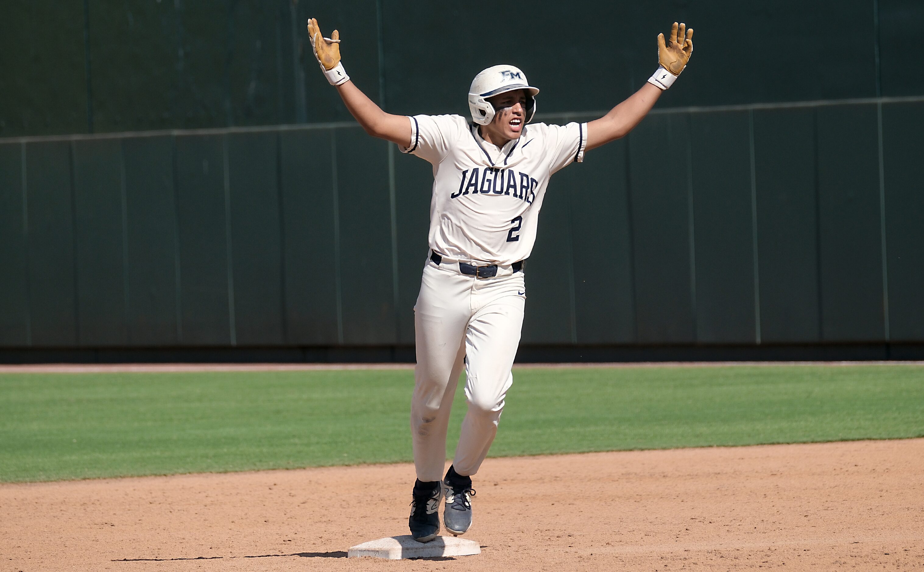 Flower Mound Adrian Rodriguez, (2), celebrates after hitting a two-run home run against...