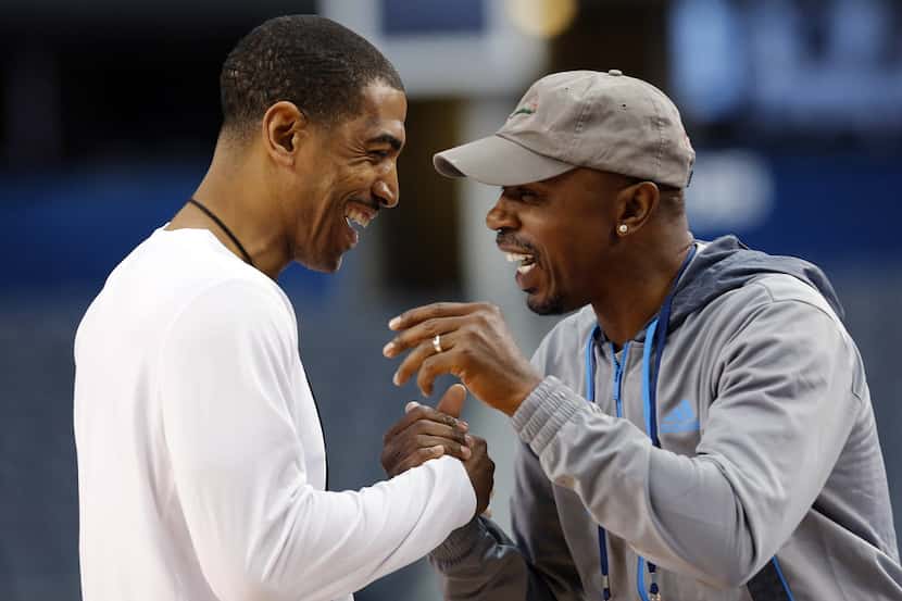 The University of Connecticut head coach Kevin Ollie shares a laugh with CBS Sports Greg...