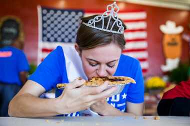 Golden Sweet Potato Queen Macie Pendergrass, 18, participates in a sweet potato pie eating...