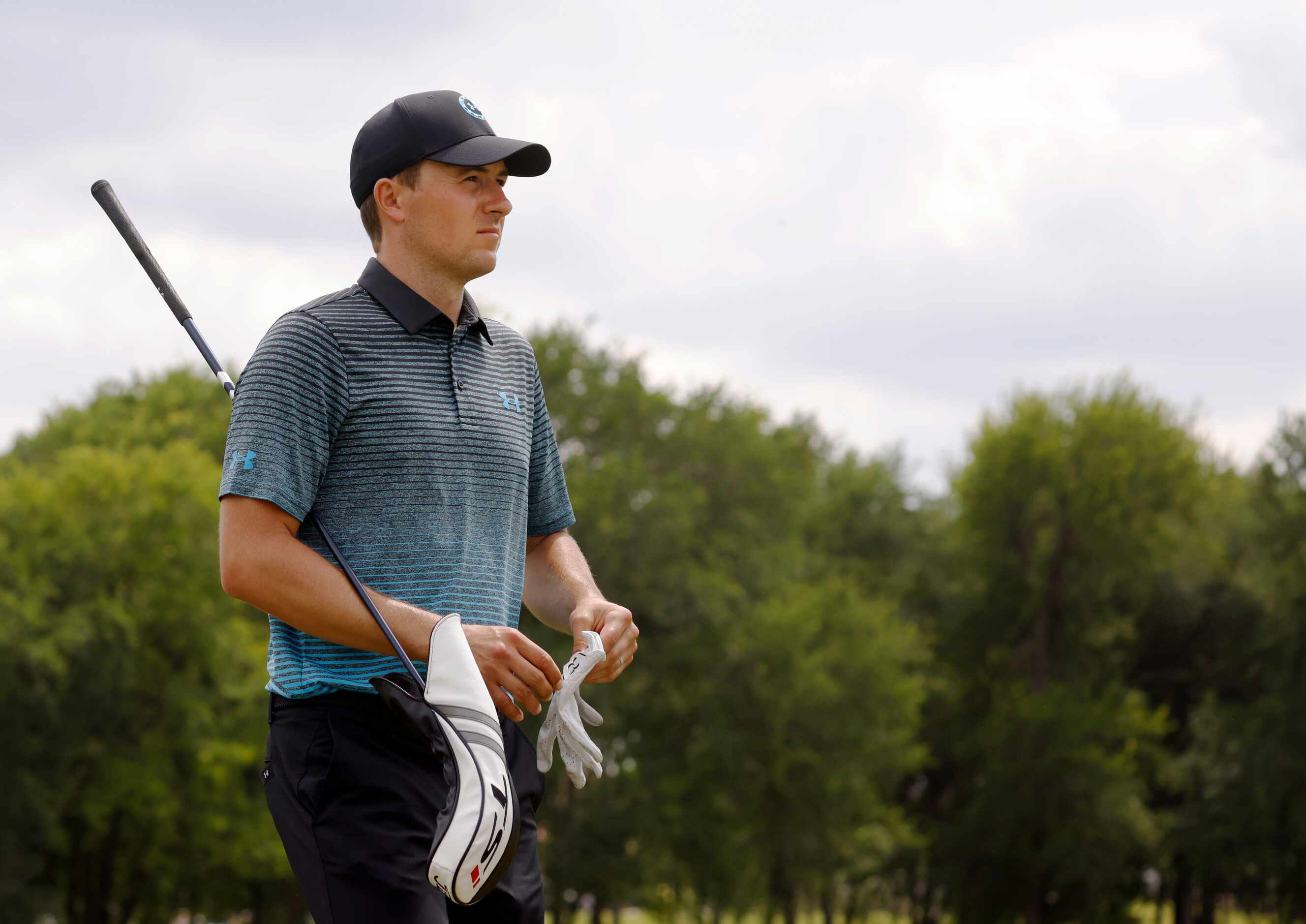 Jordan Spieth makes his way to the tee box for the 13th hole during round 3 of the AT&T...