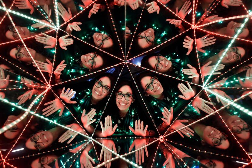 Raisa Ramos is seen inside of a kaleidoscope during the Winter Solstice Sunrise Celebration...