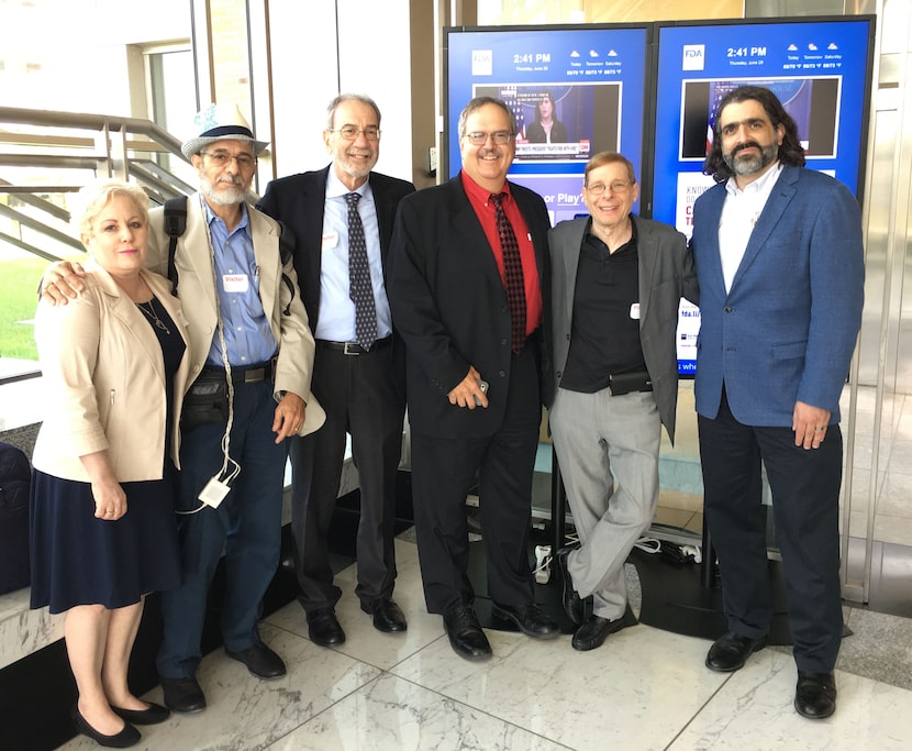 Marni Weiss (left) poses with (from left to right) her husband Jeffrey Weiss, Dr. Henry...