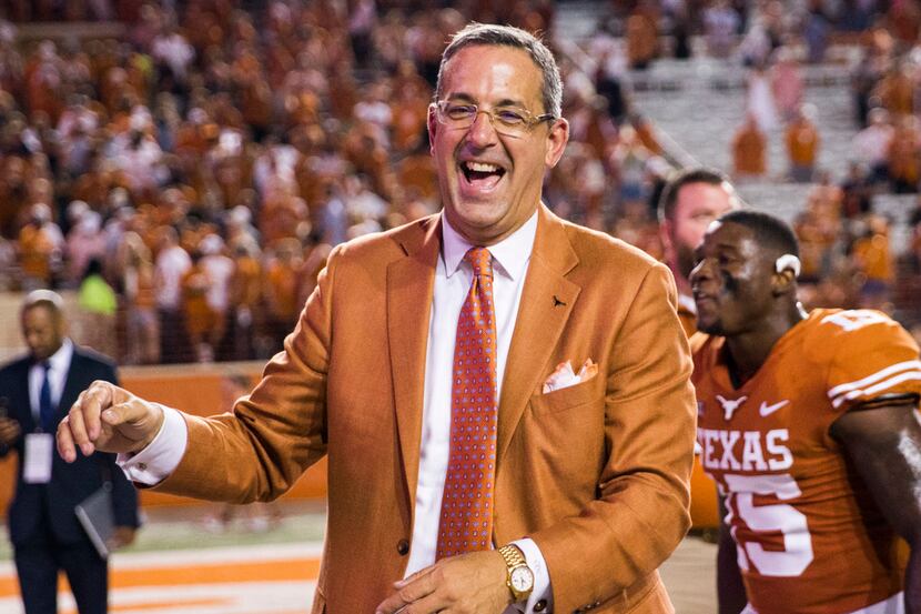 Texas Longhorns Athletic Director Chris Del Conte smiles after a 37-14 win over the USC...