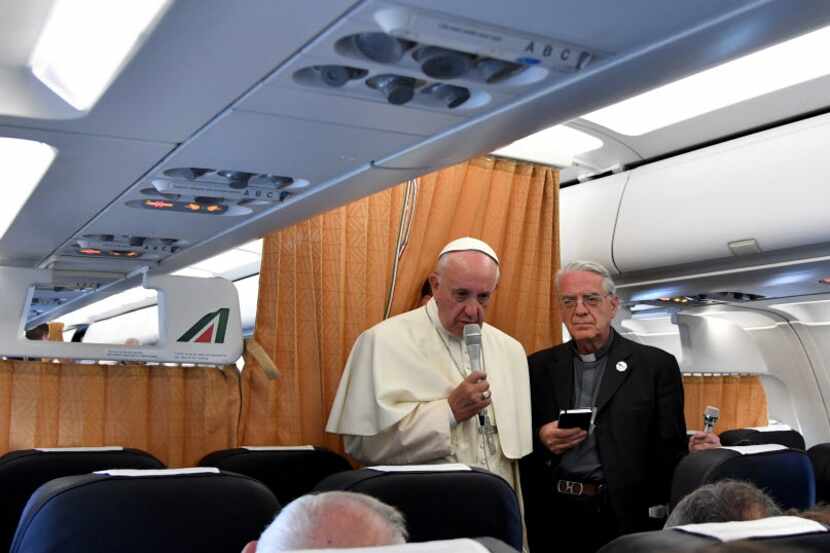 Pope Francis speaks to journalists on his flight back to Rome following a visit at Armenia...