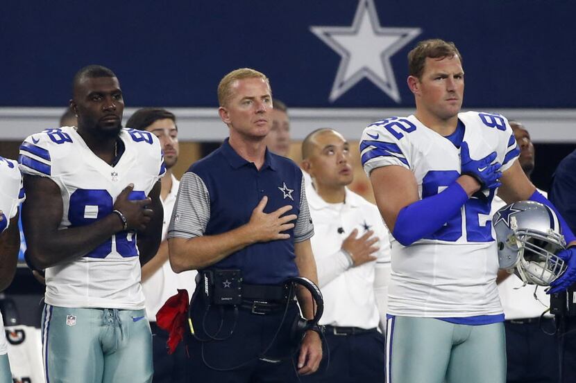 Dallas Cowboys' Dez Bryant, from left, head coach Jason Garrett and Jason Witten (82) stand...