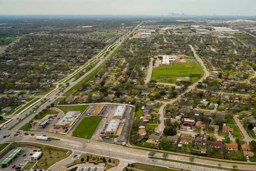 Aerial view of Military Parkway looking west toward the downtown Dallas skyline on Thursday,...