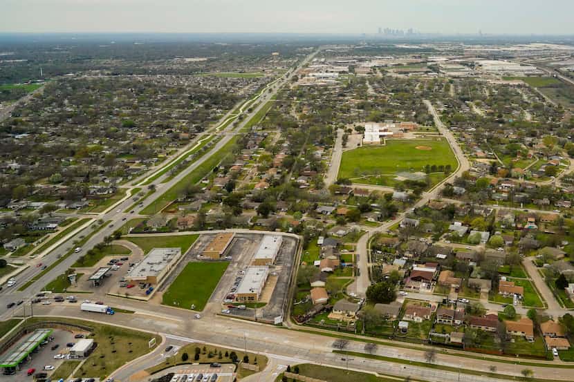 Aerial view of Military Parkway looking west toward the downtown Dallas skyline on Thursday,...