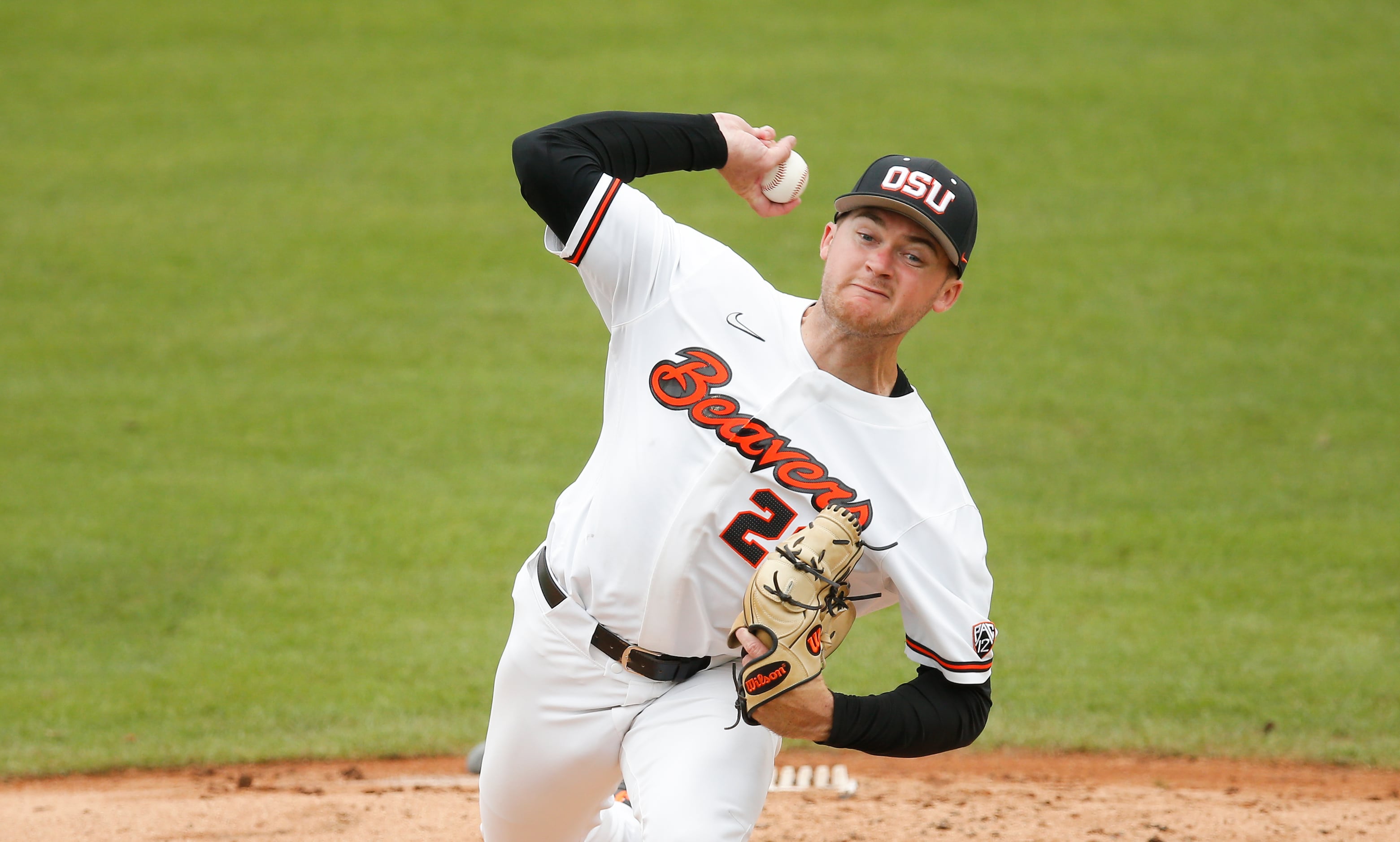 Oregon St. starting pitcher Kevin Abel (23) throws in the third inning during the NCAA Fort...
