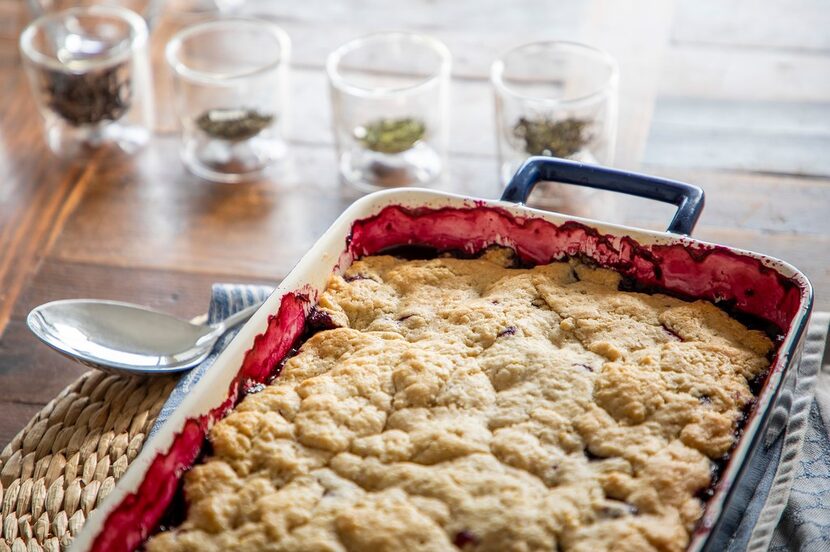 A pan of Black and Blue Cornmeal Cobbler 