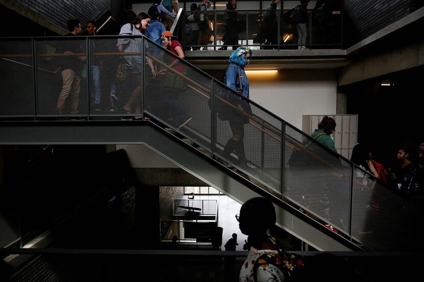 Students move in the hallway in between classes during the first day of school  at Booker T....