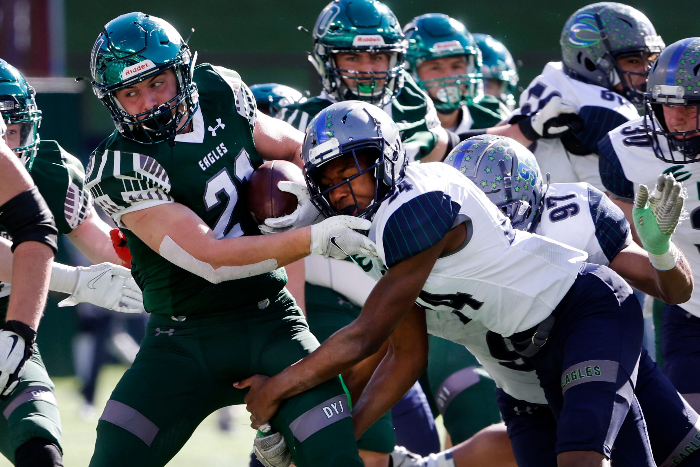 Eaton’s Chase Whitebear (24) tackles Prosper’s Jacob Devenny (21) during the Class 6A...