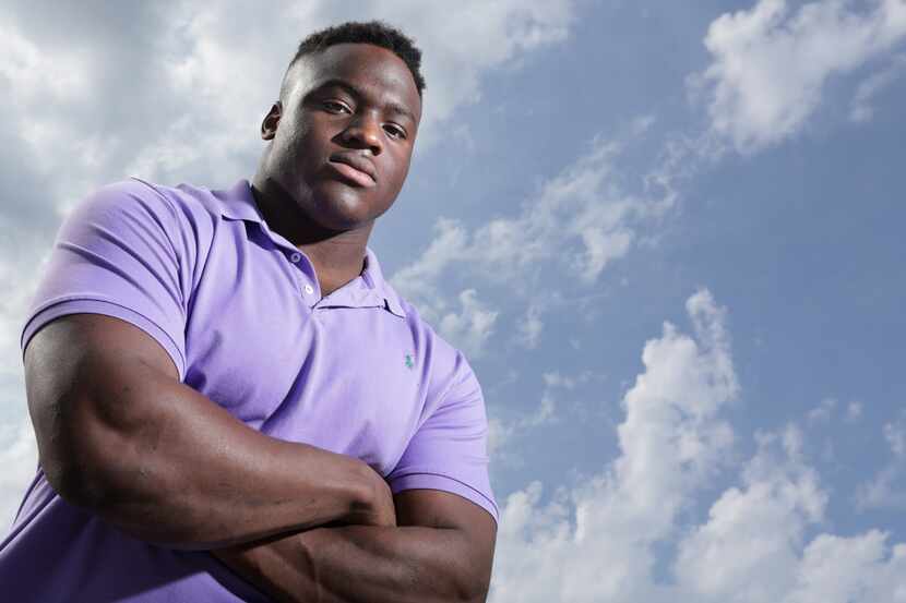 Justin Madubuike poses for photograph at his home in Parker, TX, on Apr. 21, 2020.