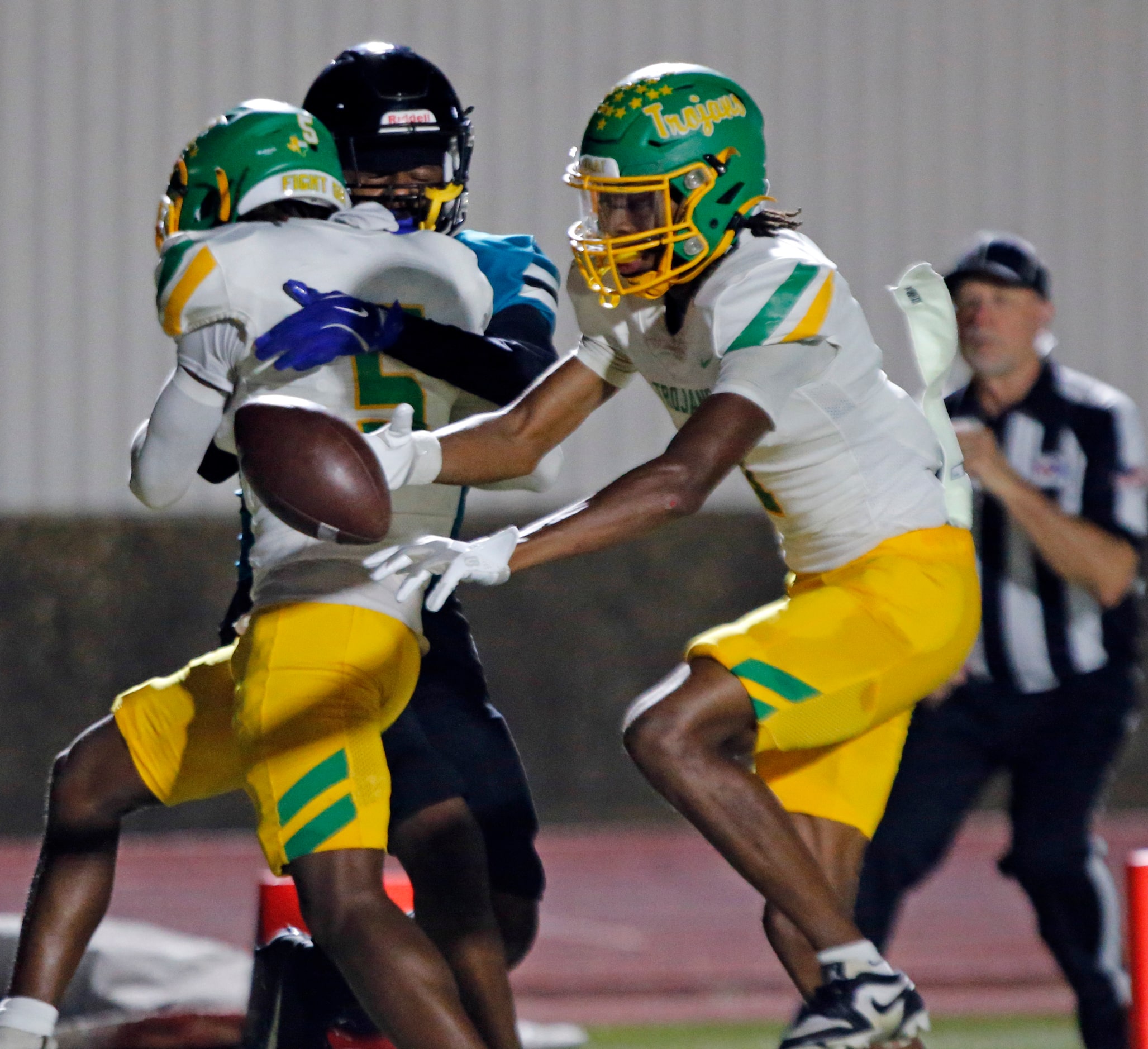 Carrollton Newman Smith High defender Evan Acton (1) can’t hold on to what would have been...