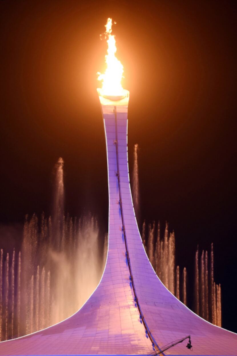 The Olympic flame was lit outside Fisht Olympic Stadium at Friday's opening ceremony in...