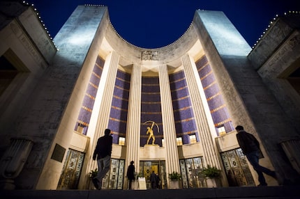 Visitors arrive at the Hall of State for "The Physical City: Making Fair Park Work" ...