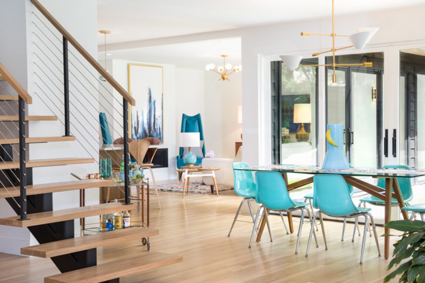 View of the dining room and floating staircase at a Casa Linda Avenue home, one of those on...