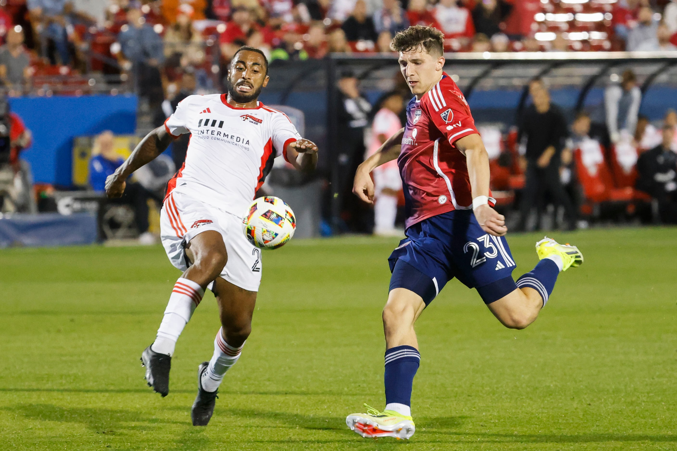 San Jose defender Carlos Akapo (left) attempts to block a shot by FC Dallas’ Logan...