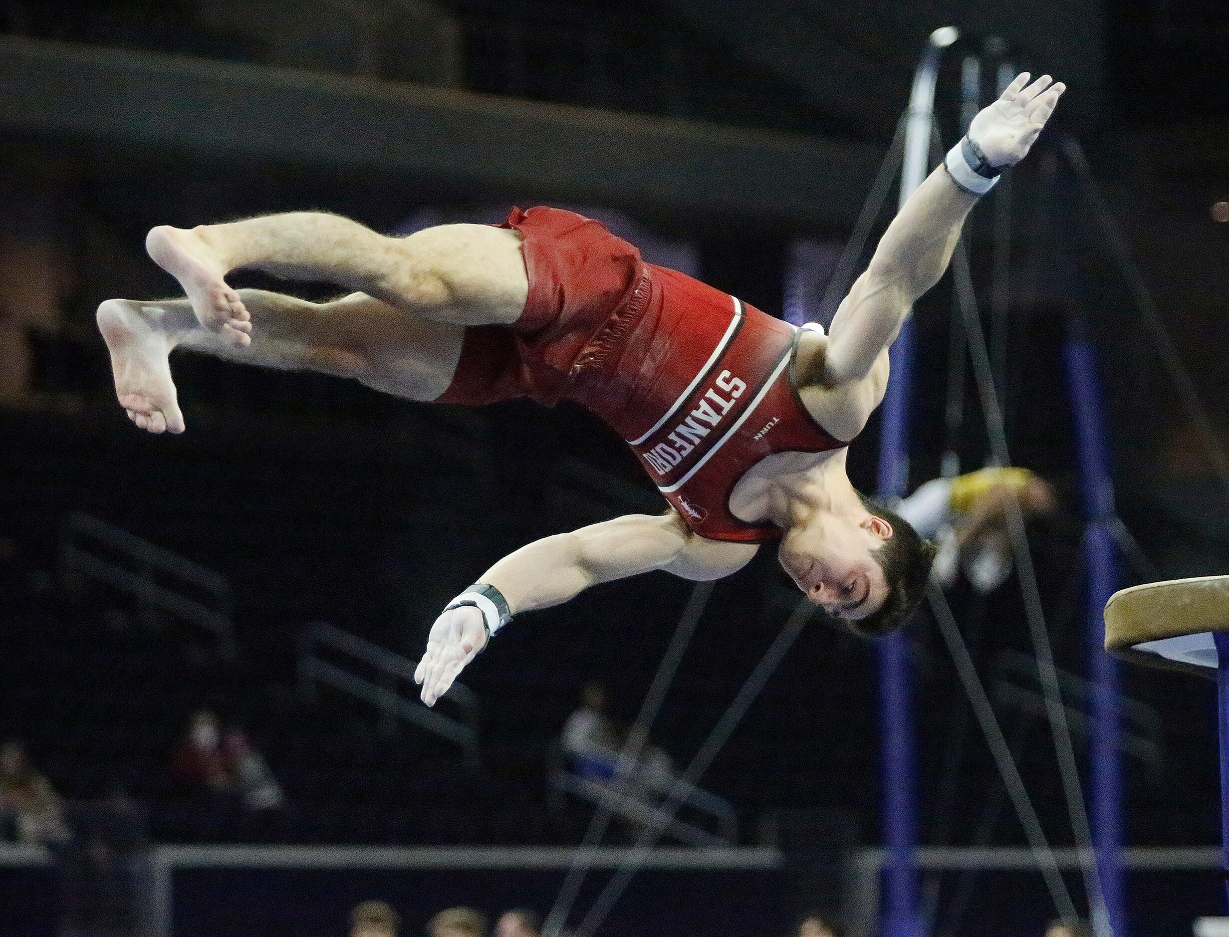 Ian Lasic-Ellis of Stanford approaches his landing on the vault during the mens finals at...