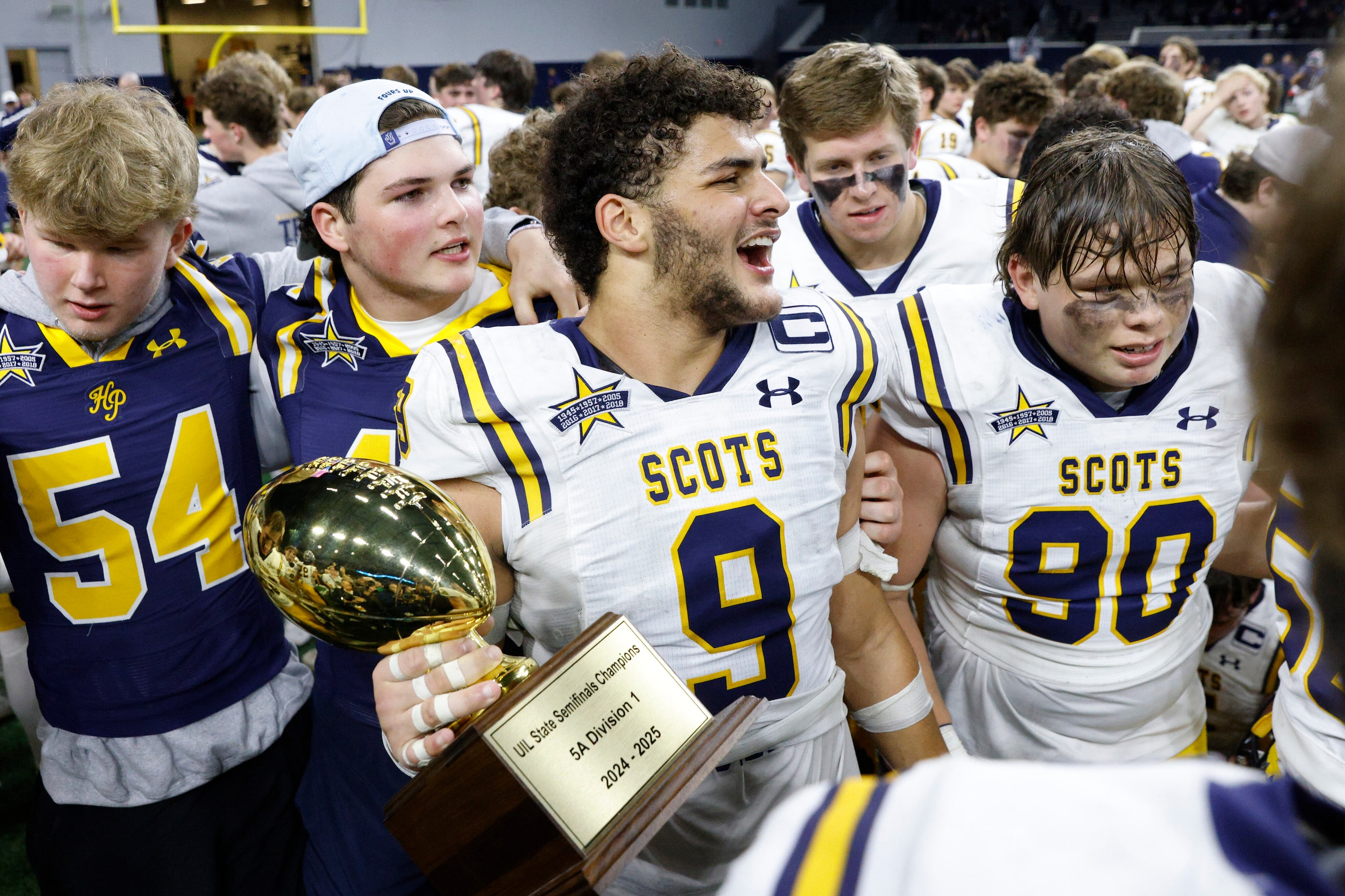 Highland Park linebacker Jack Morse (9) holds a UIL Class 5A Division I state semifinal...