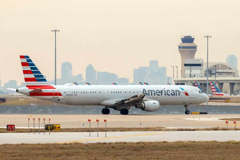 An American Airlines aircraft taxis at DFW International Airport on Tuesday, Jan. 2, 2024