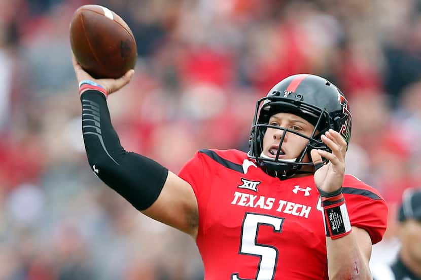 Texas Tech's Patrick Mahomes (5) passes the ball during an NCAA college football game...