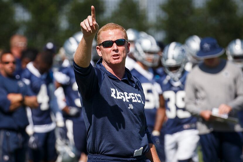 Dallas Cowboys head coach Jason Garrett gives directions during the third and final round of...