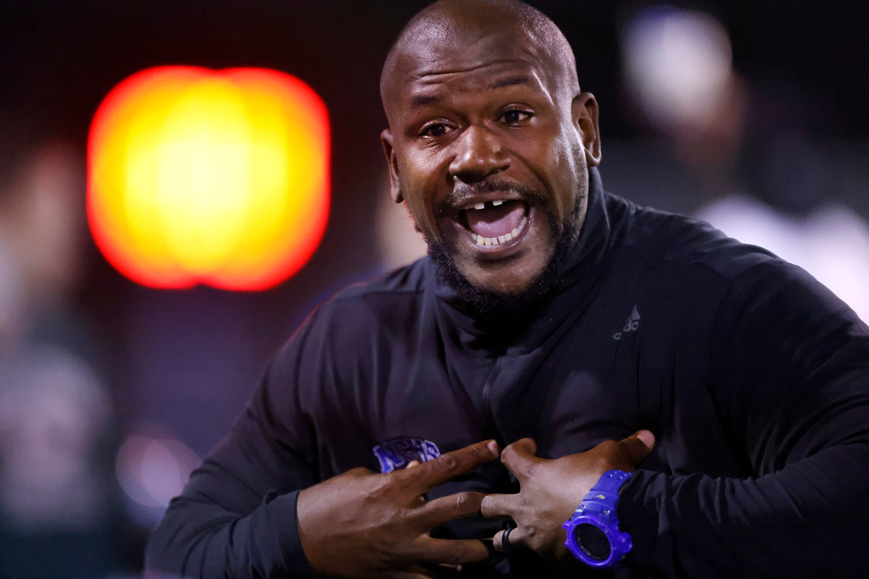 Fort Worth Nolan interim head coach KJ Williams delivers his postgame speech after defeating...