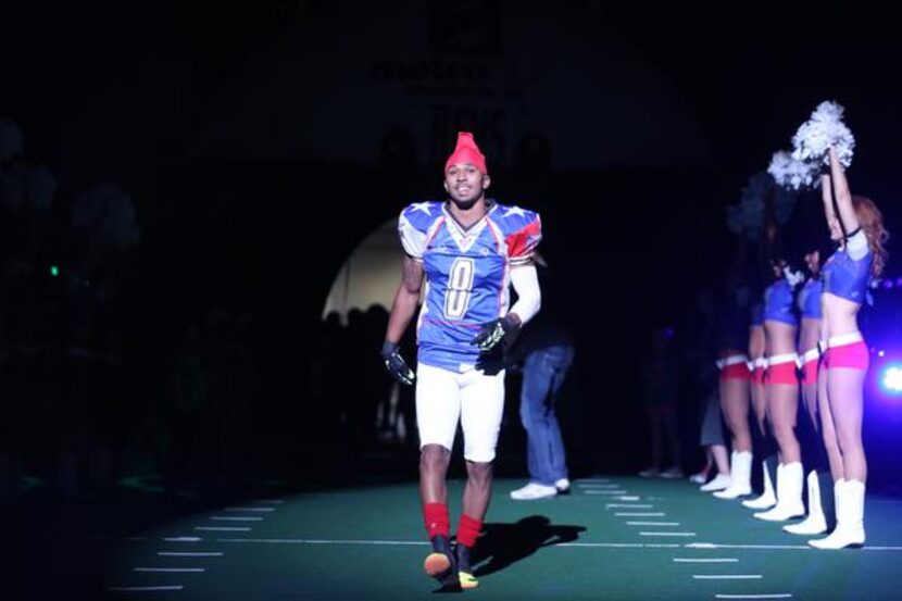 
Former Cedar Hill High School quarterback Will Cole takes the field for the Texas...