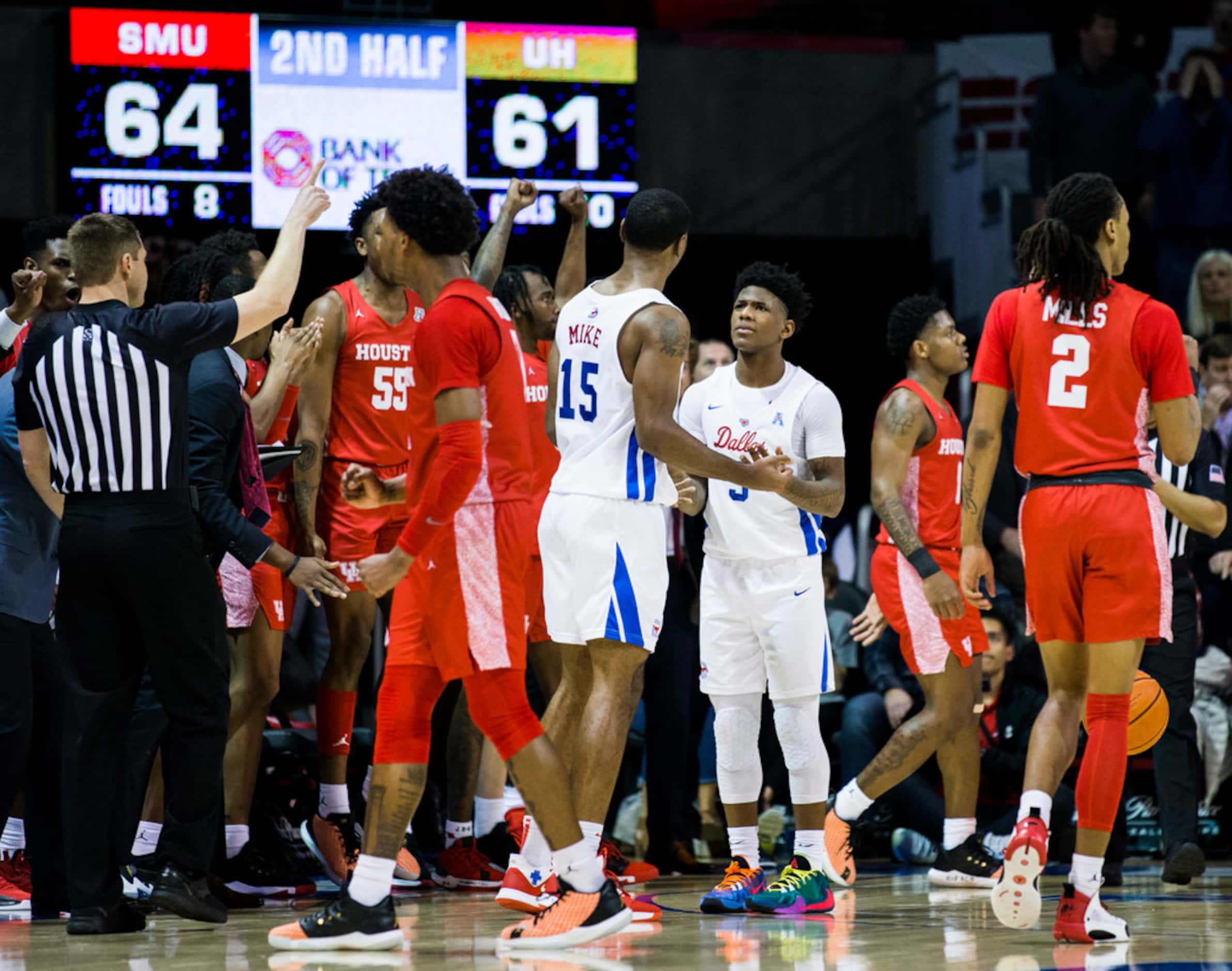 Southern Methodist Mustangs guard Kendric Davis (3) and forward Isiaha Mike (15) react to a...