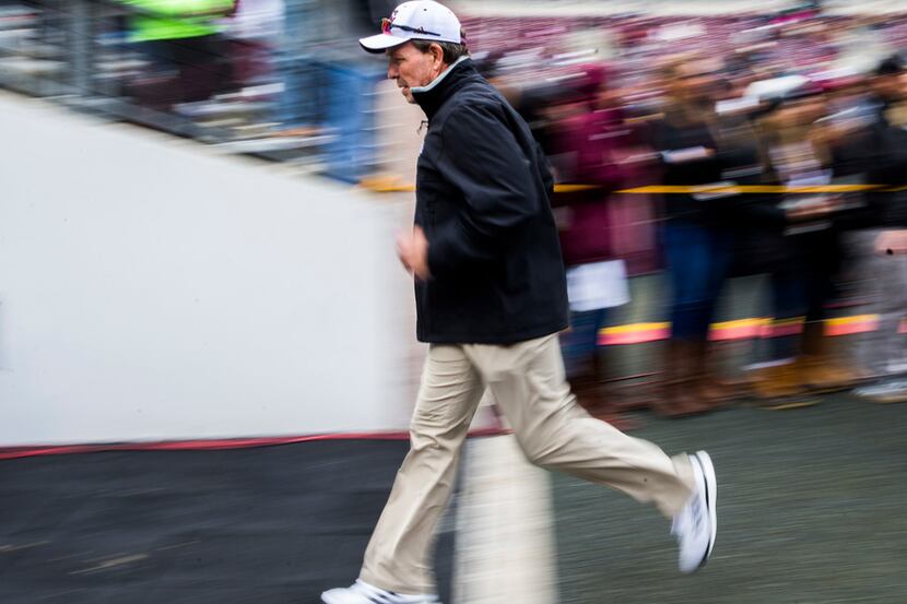 FILE - Texas A&M head coach Jimbo Fisher heads to the locker room before a game against Ole...