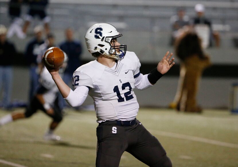 Fort Worth All Saints quarterback Shaun Taylor (12) throws against Prestonwood during the...