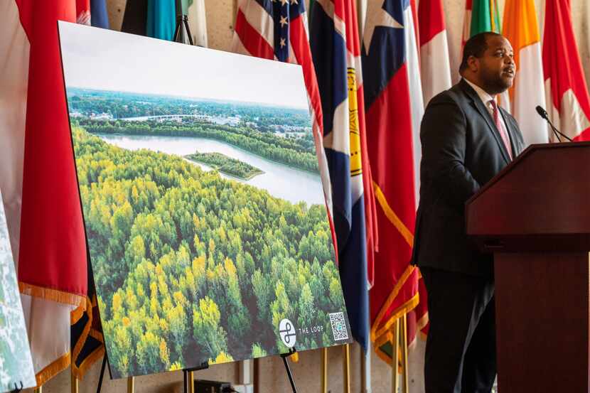 An image of Parkdale Lake is on display as Dallas Mayor Eric Johnson, right, announces a...