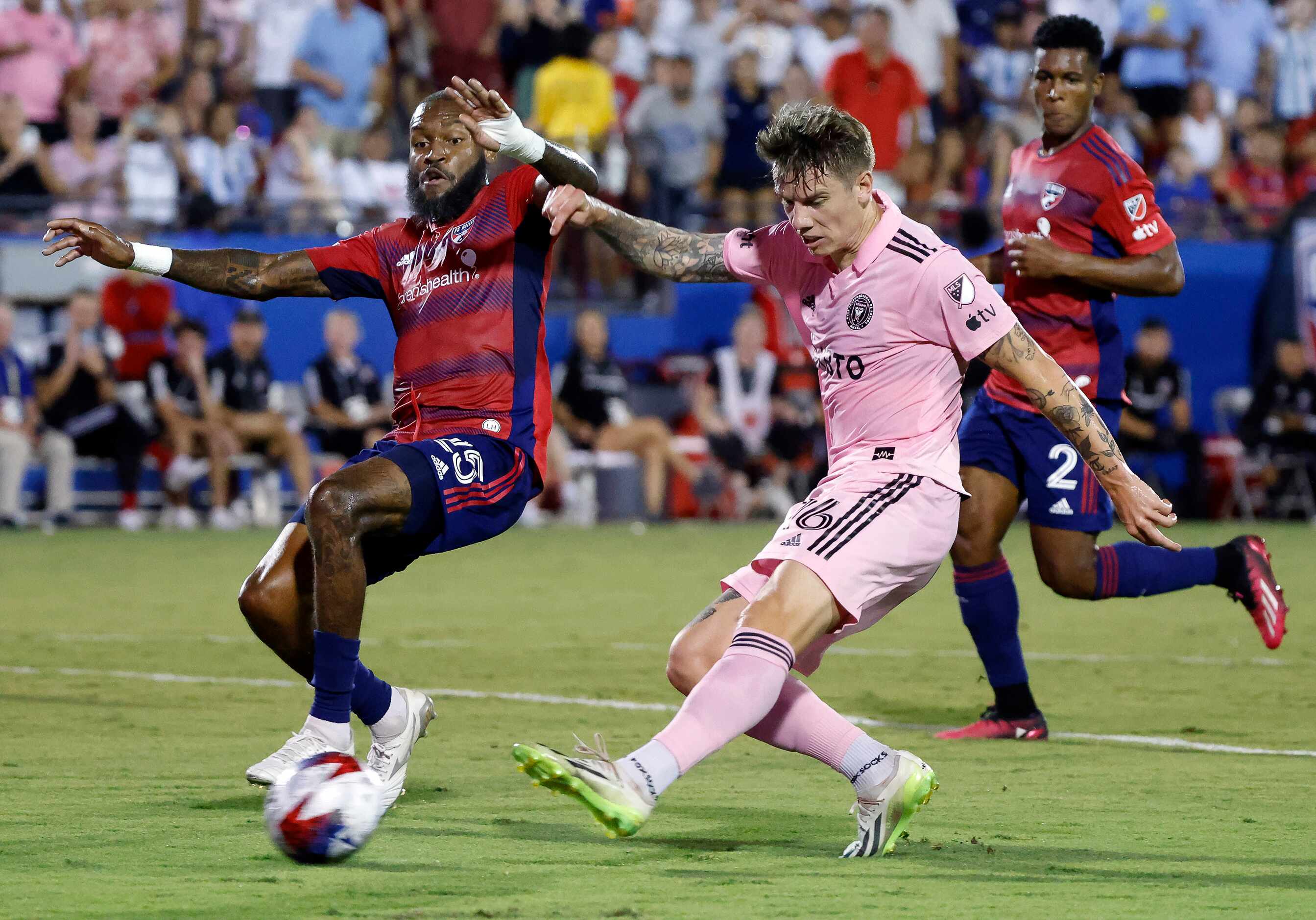 Inter Miami midfielder Robert Taylor (16) shoots past FC Dallas defender Sebastien Ibeagha...