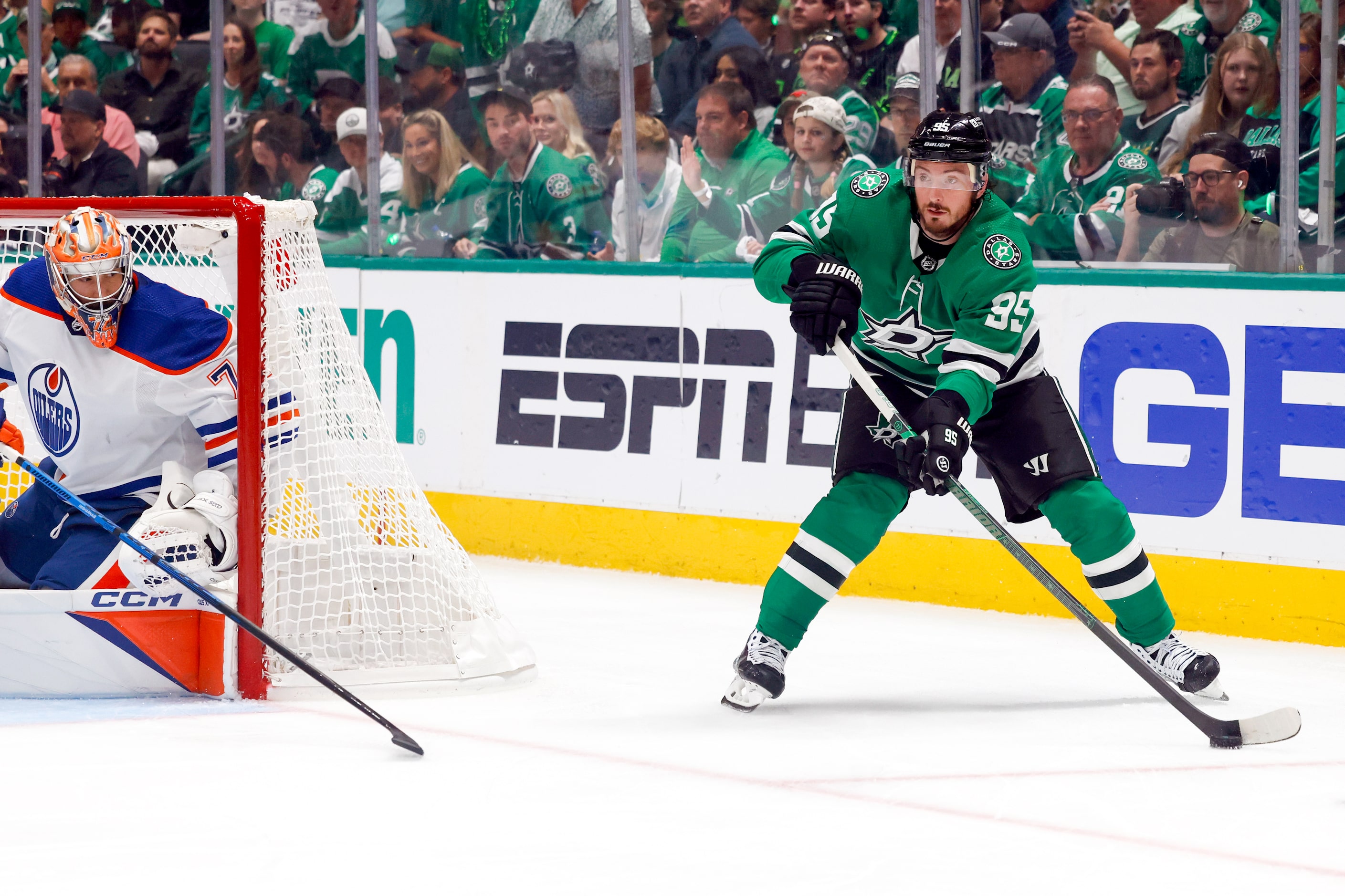 Dallas Stars center Matt Duchene (95) looks to pass as he skates behind the goal during the...