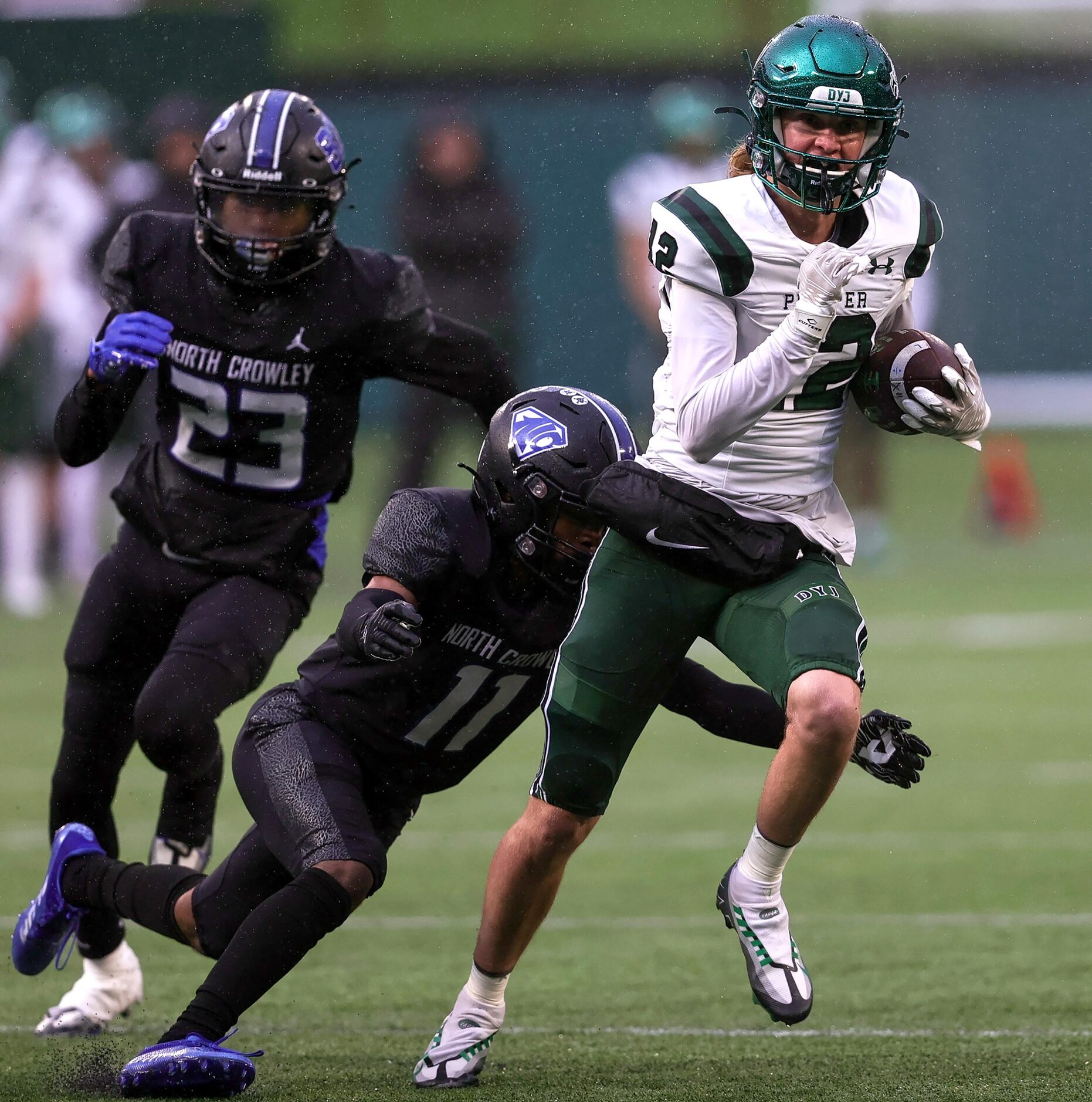 Prosper wide receiver Caden Pevehouse (12) tries to sprint past North Crowley safety Devon...