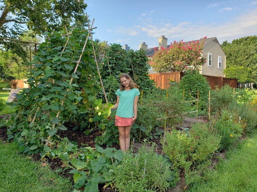 Casey Marsh enjoys her family’s garden in Grapevine.